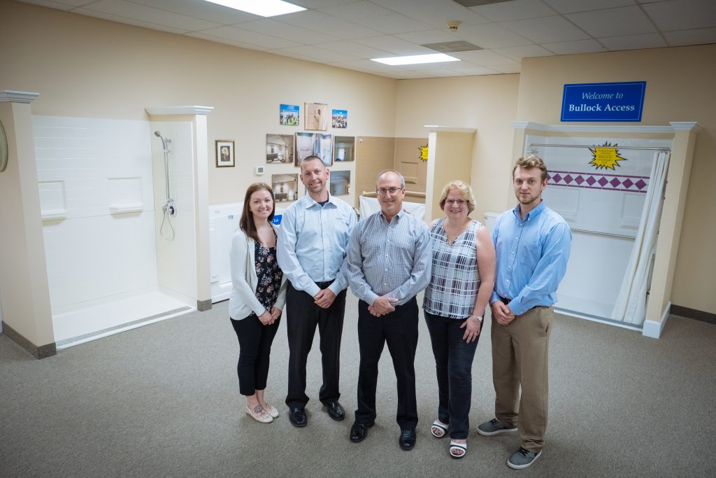 Staff in front of bestbath showers